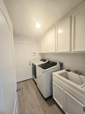 a view of utility room with washer and dryer