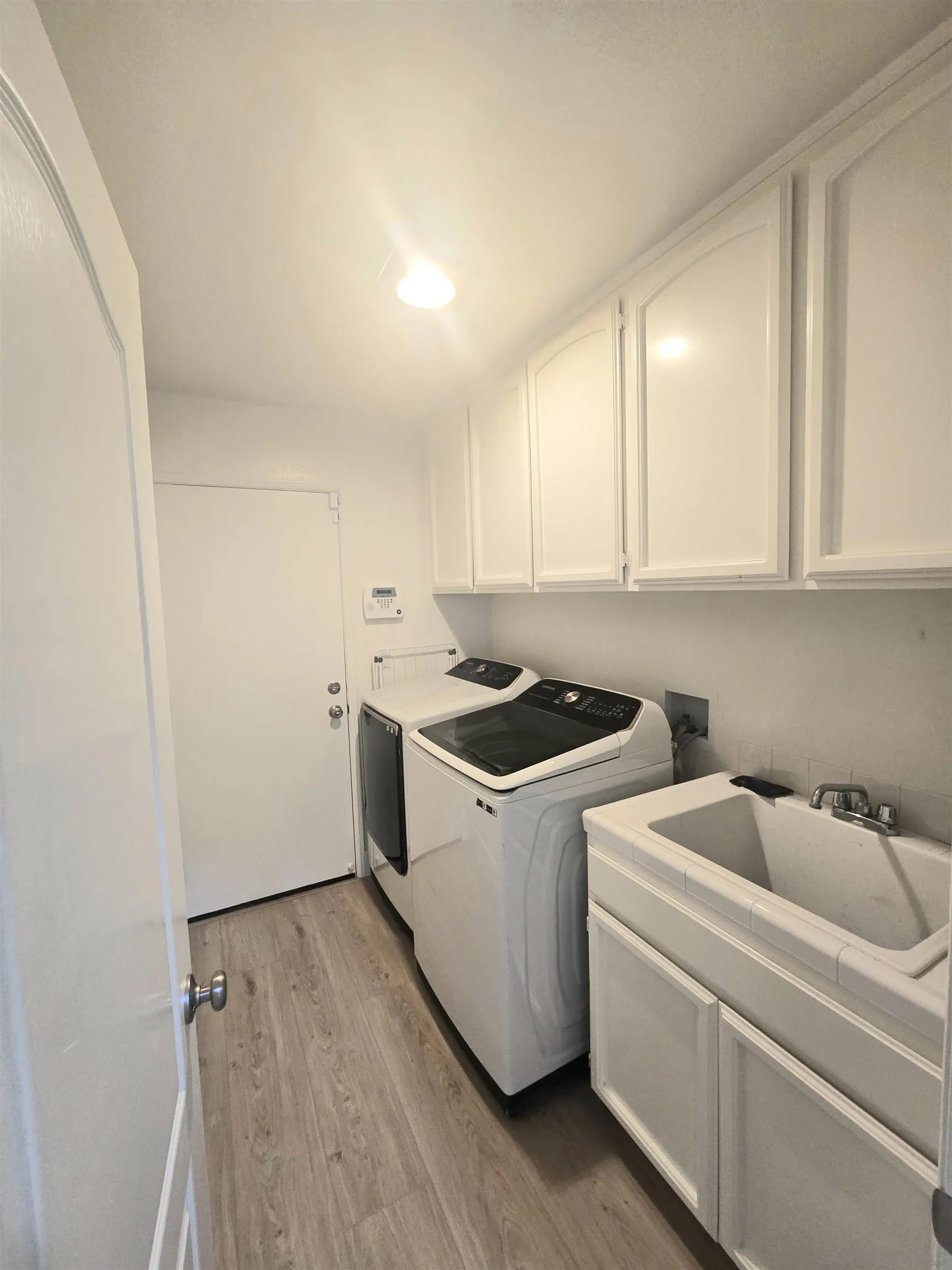 4802 Baroque Terrace Oceanside, CA 92057 - Photo 20 of 26 a view of utility room with washer and dryer