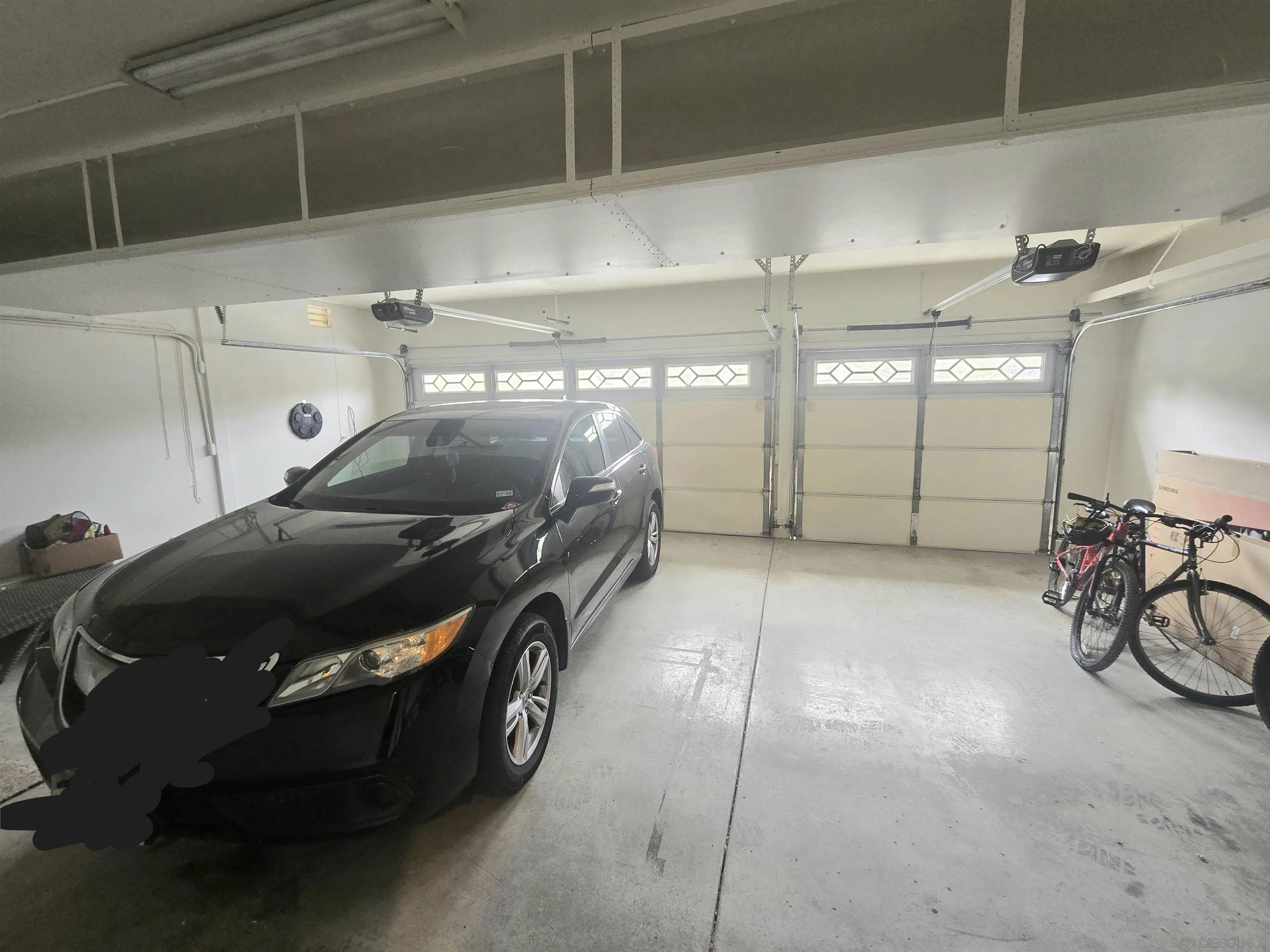 4802 Baroque Terrace Oceanside, CA 92057 - Photo 21 of 26 a car parked in a garage
