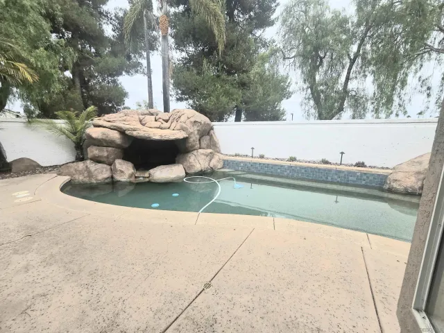 a view of swimming pool from a lake view