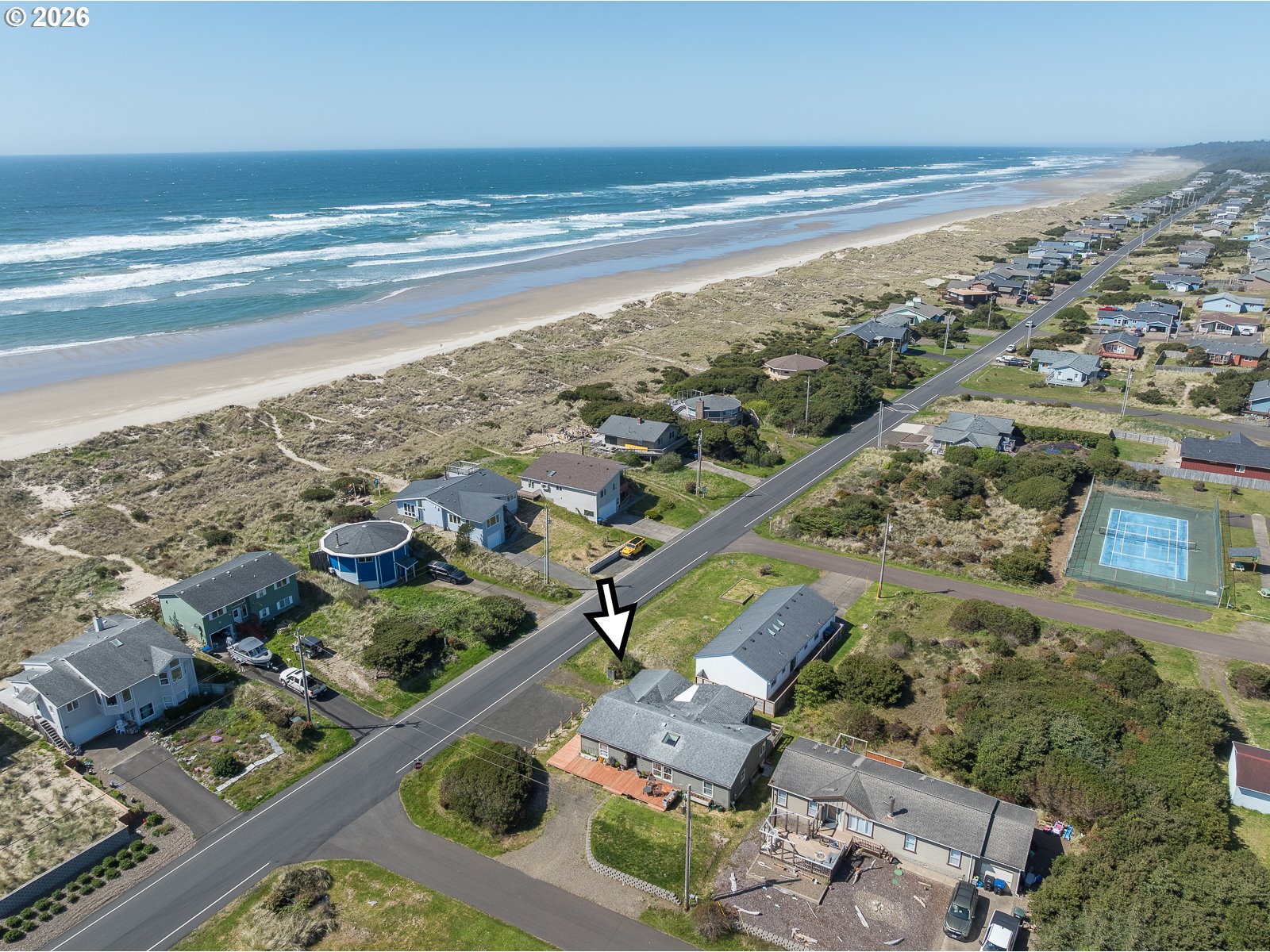 2018 Northwest Oceanic Loop Waldport, OR 97394 - Photo 34 of 35 an aerial view of ocean and residential houses