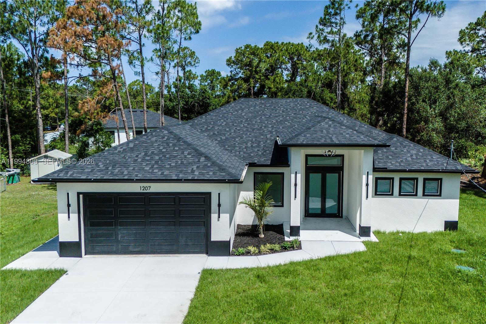 1207 Ramus Street East Lehigh Acres, FL 33974 - Photo 5 of 31
