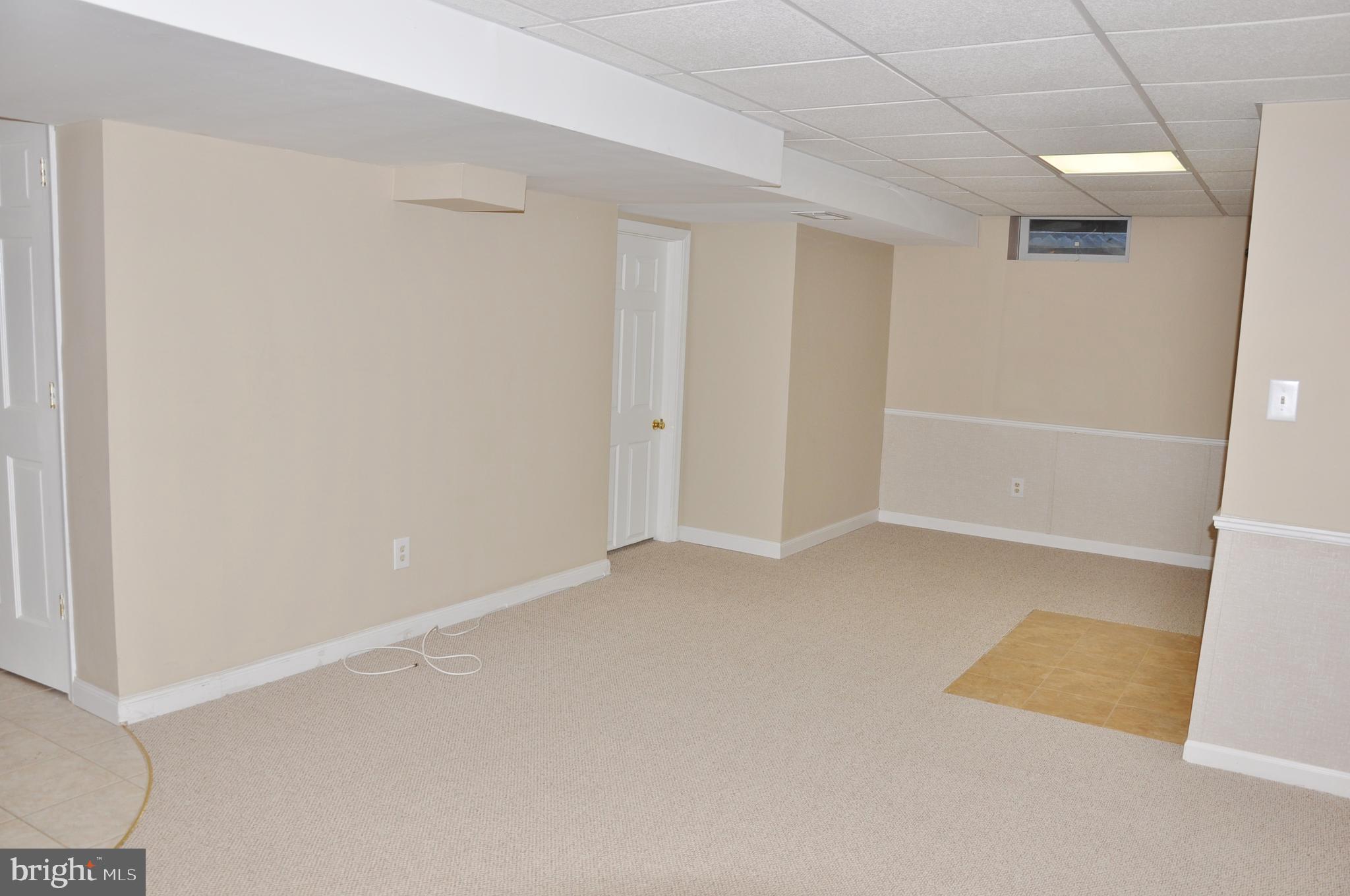 3 Perry Manor Court Perry Hall, MD 21128 - Photo 38 of 53 Recreation room w/door to possible future bedroom