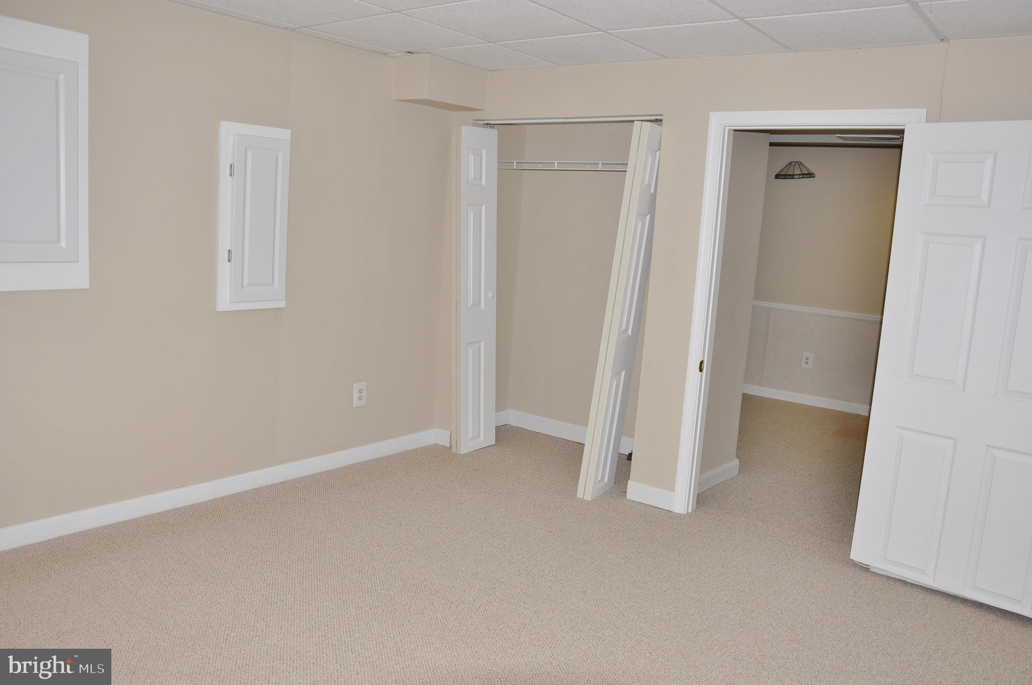 3 Perry Manor Court Perry Hall, MD 21128 - Photo 39 of 53 Basement room with closet and doorway to rec room