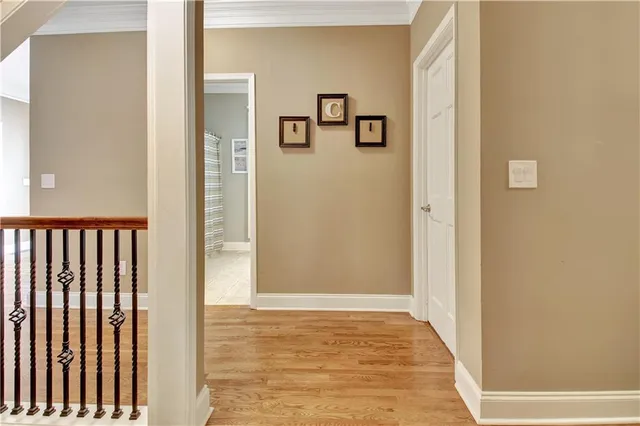 a view of a livingroom with furniture and a potted plant
