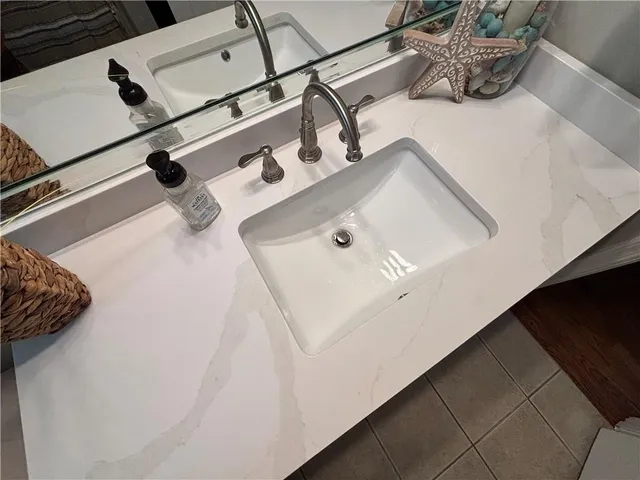 a living room with furniture gym equipment and a flat screen tv