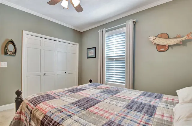 a front view of a house with a yard and fountain