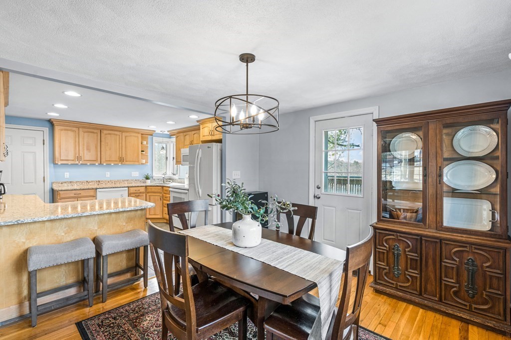 352 West Street Reading, MA 01867 - Photo 15 of 37 a view of a dining room with furniture window and wooden floor