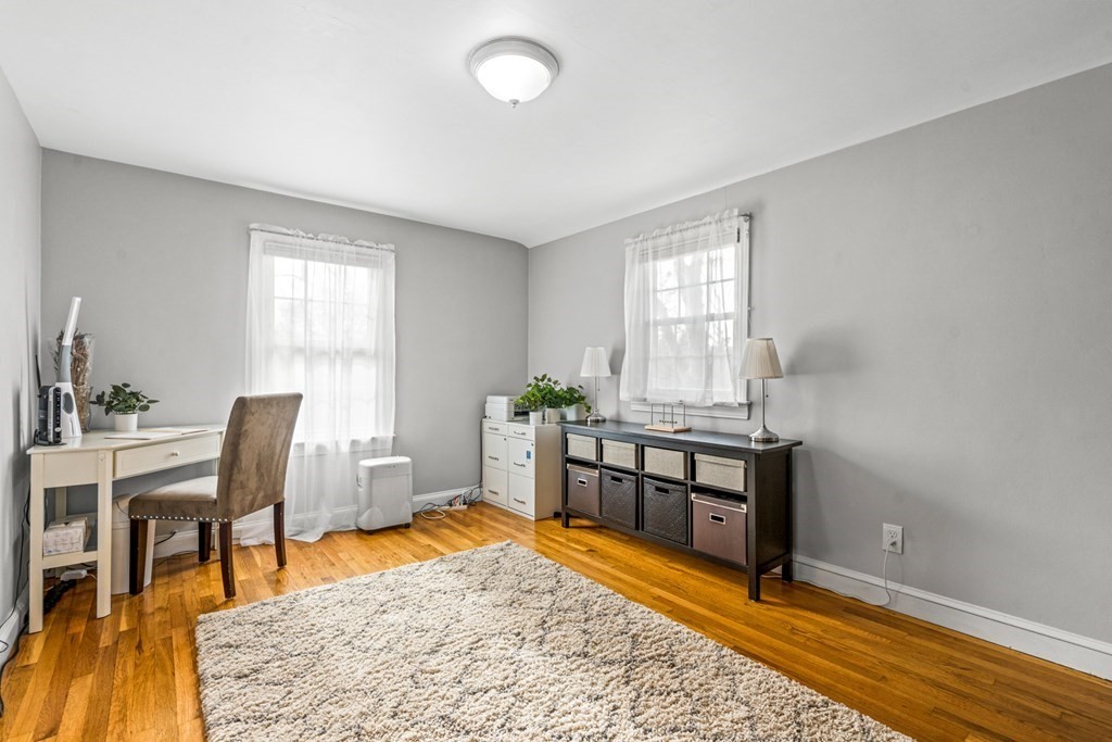 352 West Street Reading, MA 01867 - Photo 28 of 37 a view of a workspace with furniture and a window