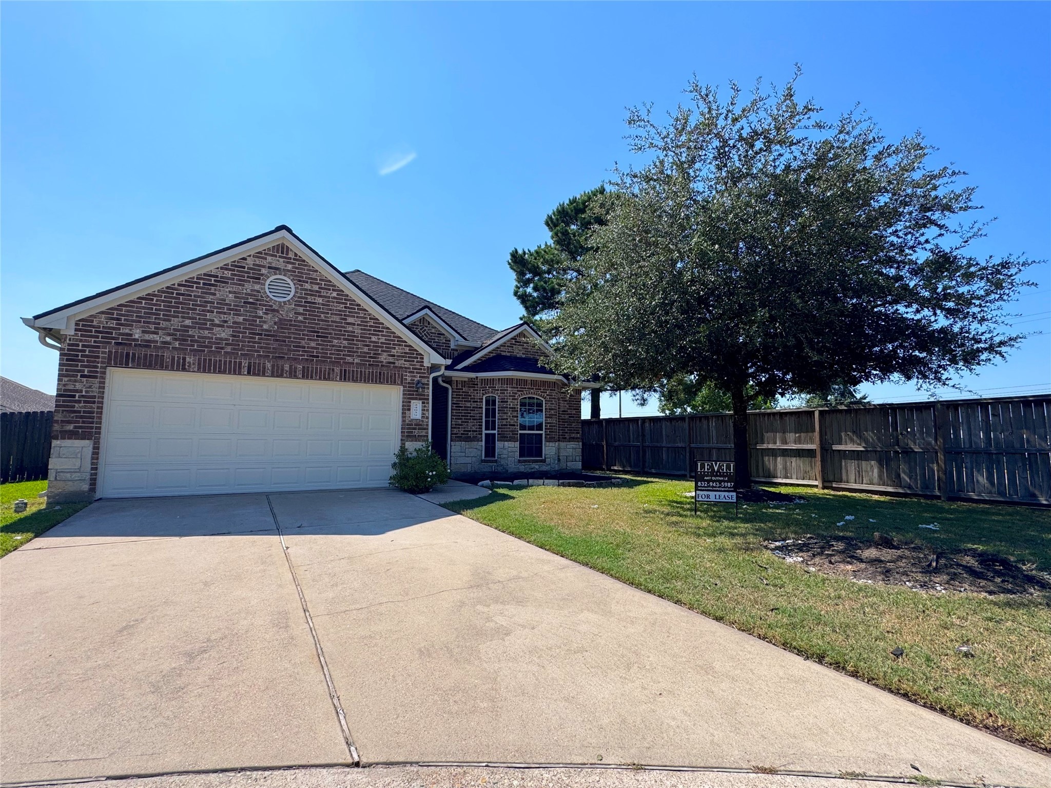 24039 Augusta Falls Lane Spring, TX 77389 - Photo 1 of 18 a view of a house with backyard and trees