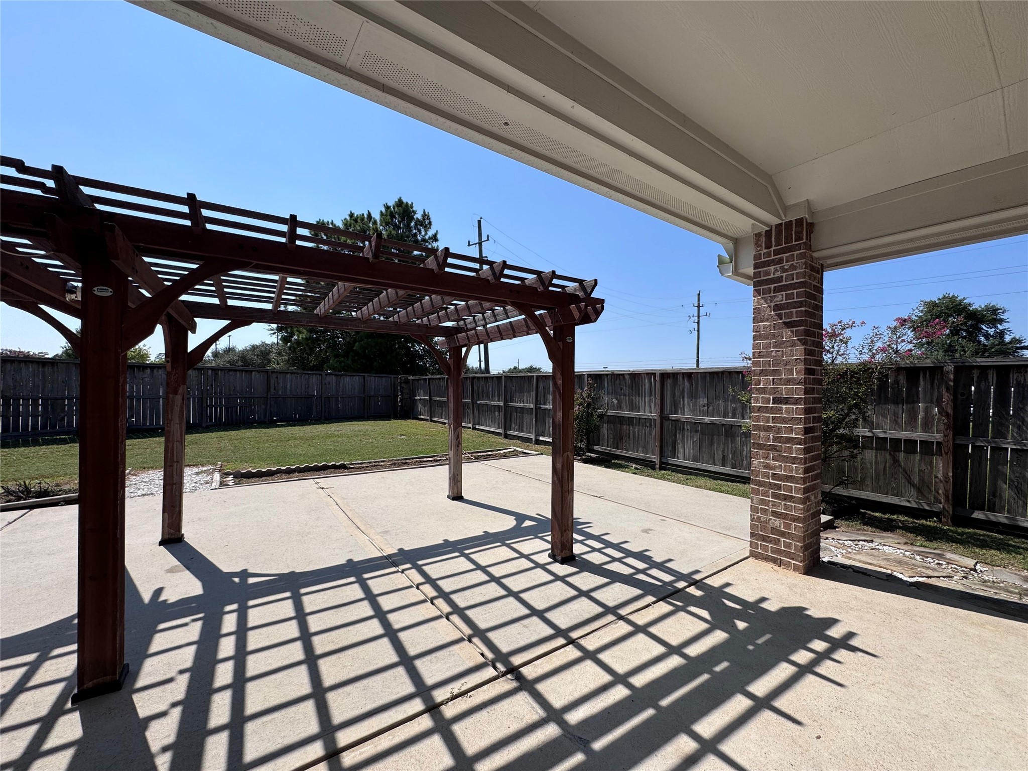 24039 Augusta Falls Lane Spring, TX 77389 - Photo 16 of 18 a view of a terrace with wooden floor