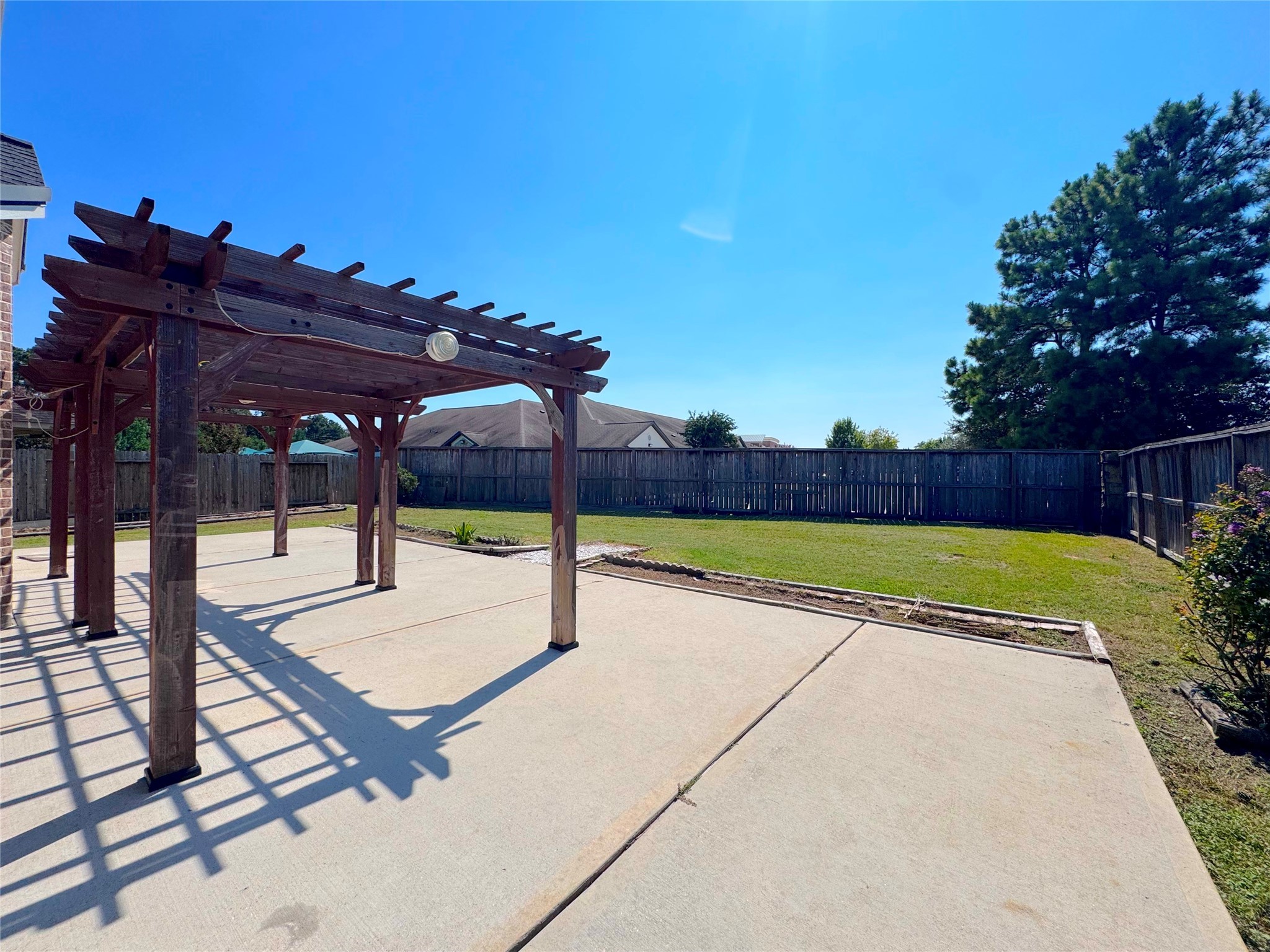 24039 Augusta Falls Lane Spring, TX 77389 - Photo 17 of 18 a view of a backyard with a slide