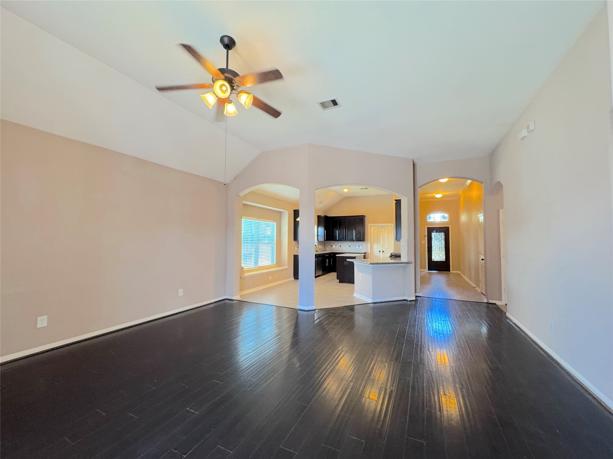 24039 Augusta Falls Lane Spring, TX 77389 - Photo 4 of 18 a view of empty room with wooden floor and fan