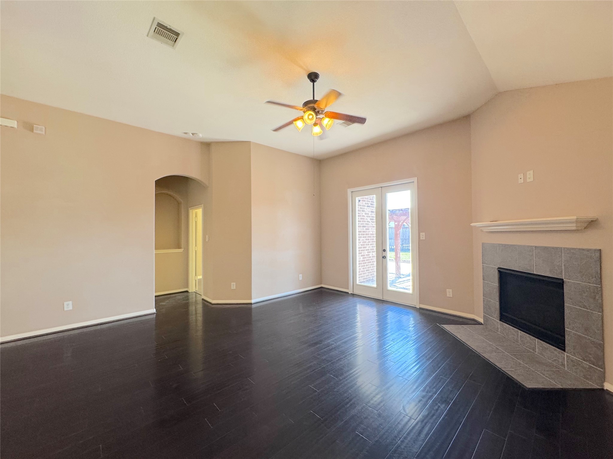 24039 Augusta Falls Lane Spring, TX 77389 - Photo 5 of 18 a view of an empty room with window and wooden floor