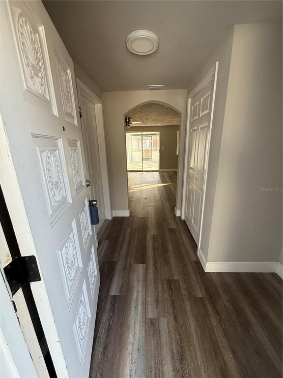 7104 Ingleside Drive Port Richey, FL 34668 - Photo 2 of 14 a view of entryway with wooden floor