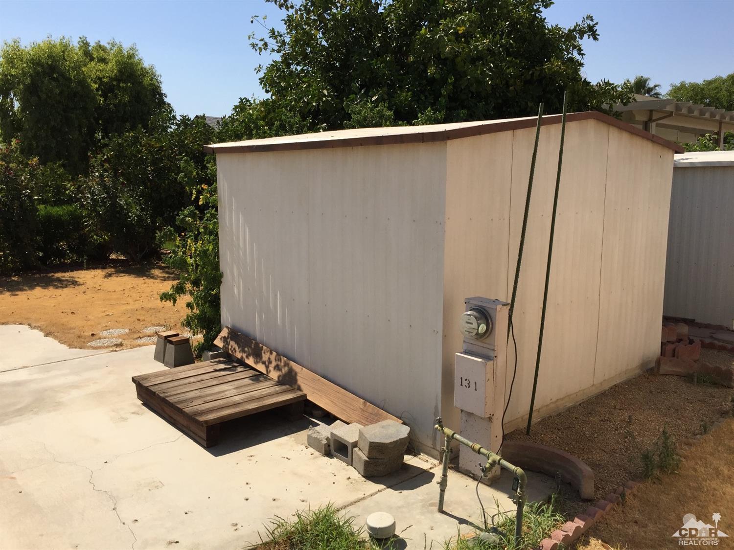 81620 Ave 49, Unit 131A Indio, CA 92201 - Photo 5 of 8 a backyard of a house