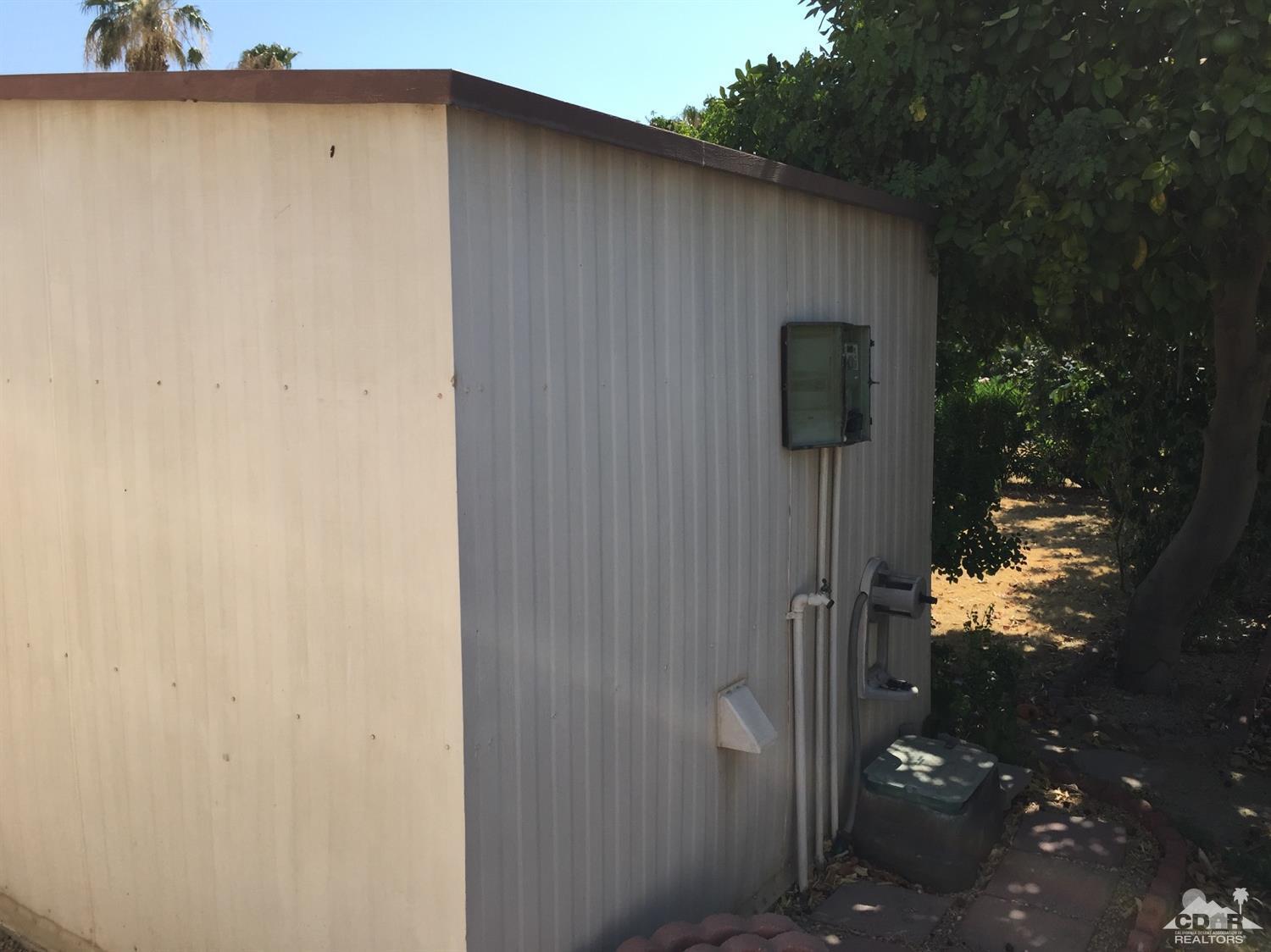 81620 Ave 49, Unit 131A Indio, CA 92201 - Photo 6 of 8 a backyard of a house