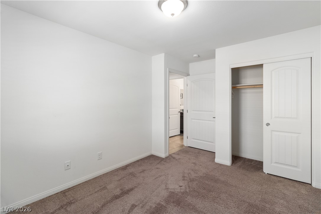 2269 Chandler Ranch Place Laughlin, NV 89029 - Photo 38 of 96 Bedroom with carpet and a closet