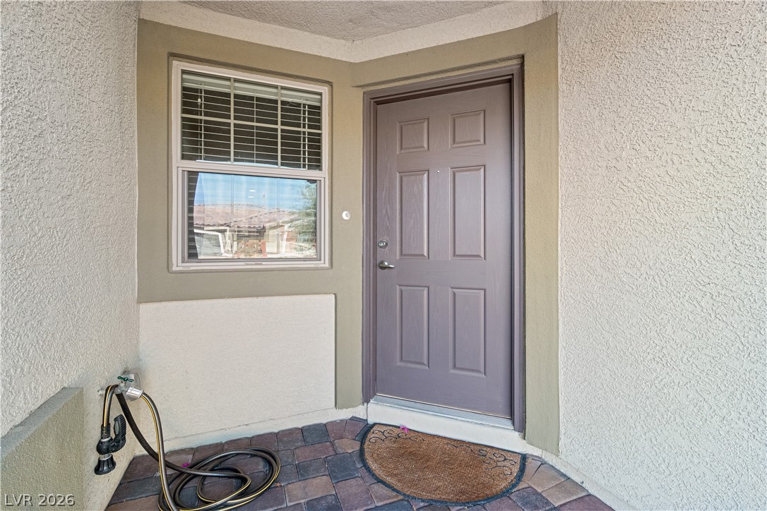 2269 Chandler Ranch Place Laughlin, NV 89029 - Photo 4 of 96 Property entrance featuring stucco siding