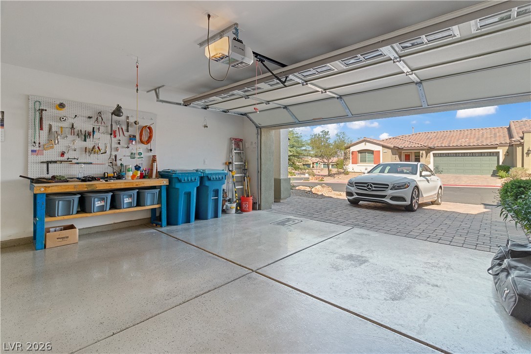 2269 Chandler Ranch Place Laughlin, NV 89029 - Photo 44 of 96 Garage with a workshop area and a garage door opener