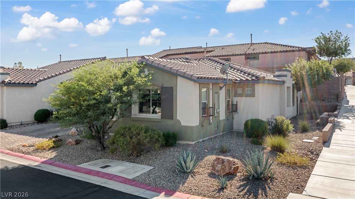 2269 Chandler Ranch Place Laughlin, NV 89029 - Photo 61 of 96 View of front of house featuring stucco siding and a tiled roof