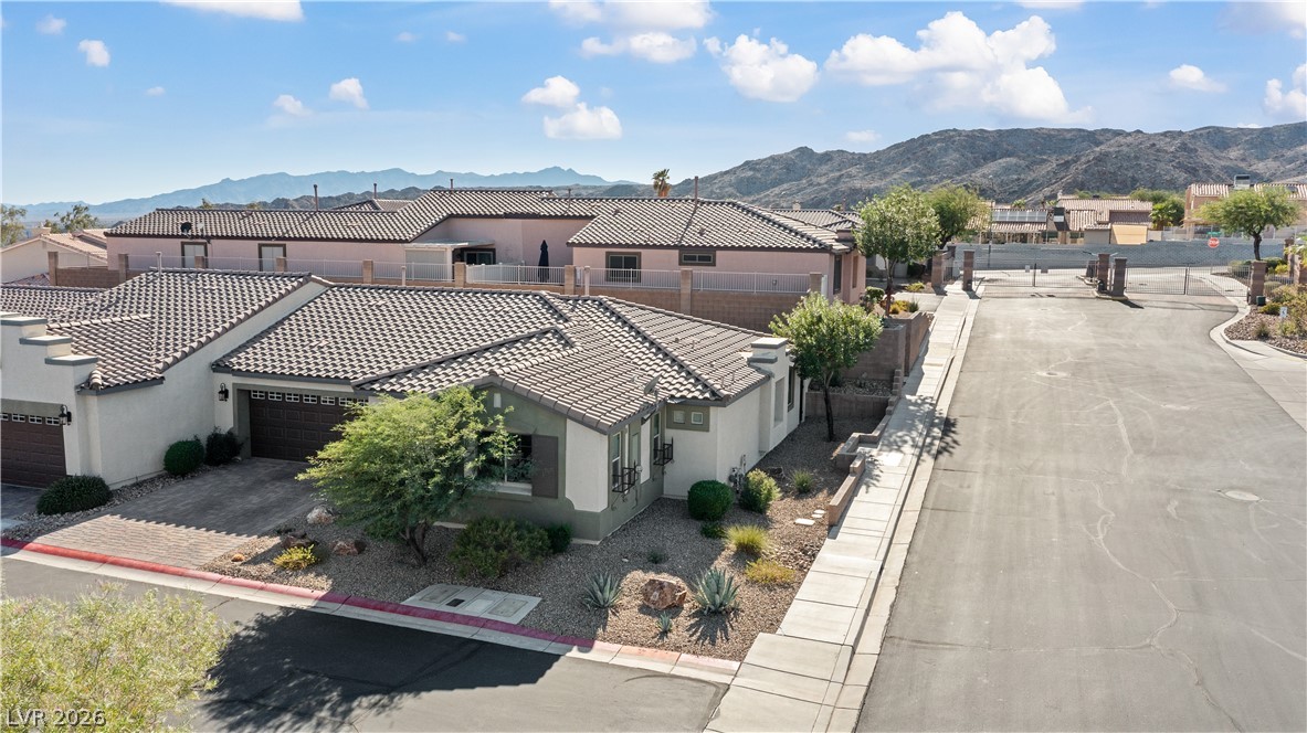 2269 Chandler Ranch Place Laughlin, NV 89029 - Photo 68 of 96 Aerial view of residential area with a mountain backdrop