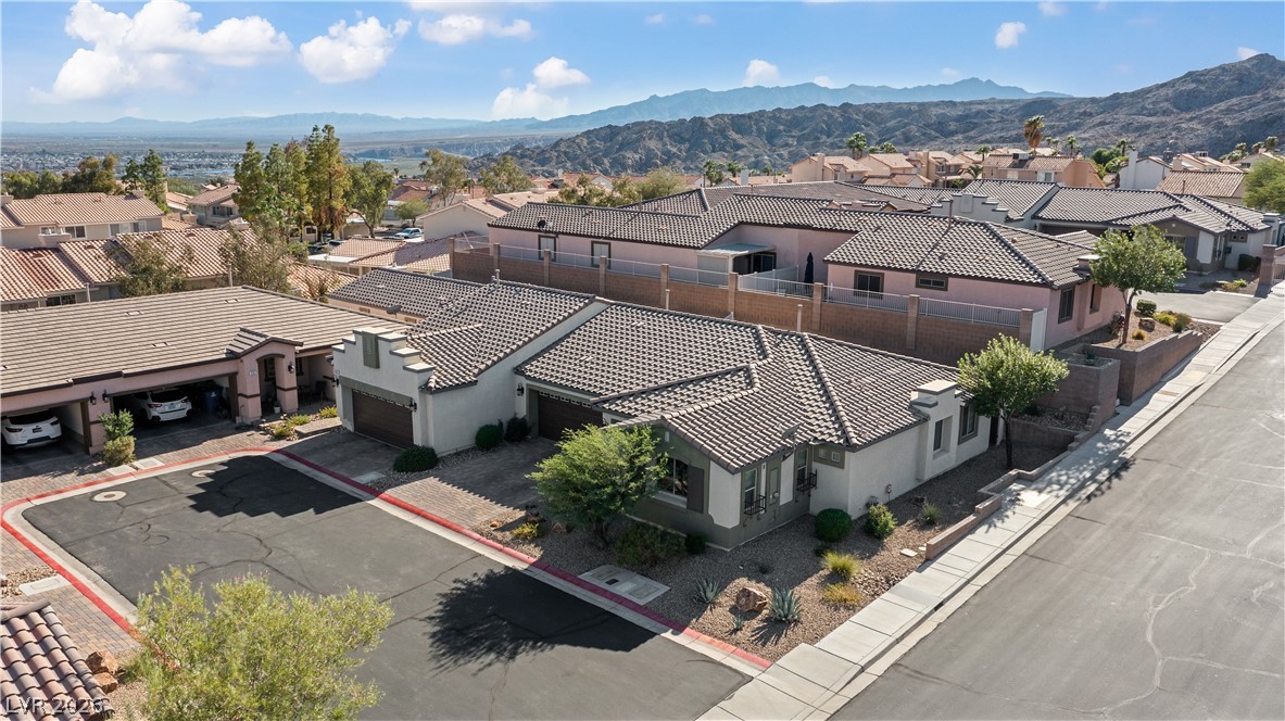 2269 Chandler Ranch Place Laughlin, NV 89029 - Photo 69 of 96 Aerial view of residential area featuring a mountain backdrop