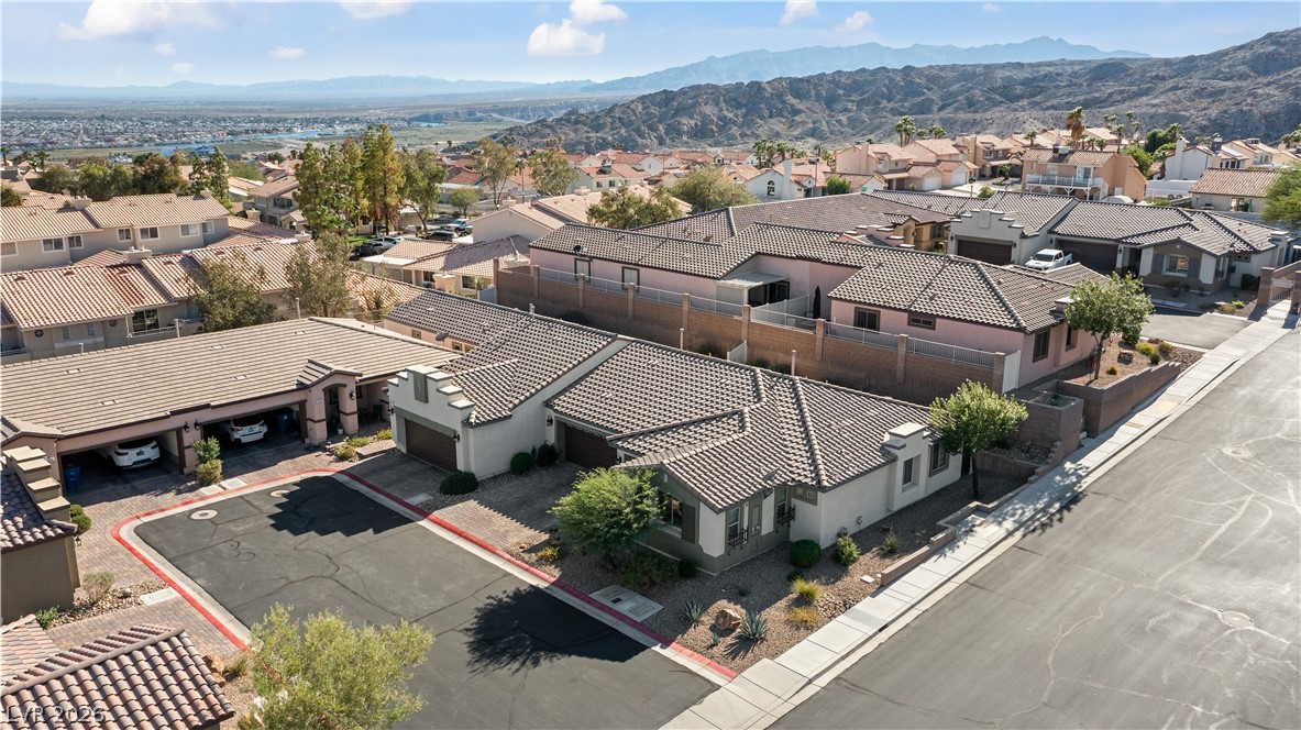 2269 Chandler Ranch Place Laughlin, NV 89029 - Photo 70 of 96 Aerial perspective of suburban area featuring a mountainous background