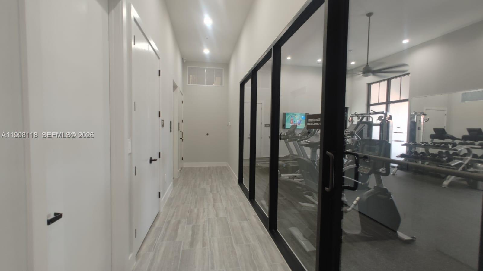 13313 Southwest 287th Terrace Homestead, FL 33033 - Photo 15 of 26 a view of a hallway with living room and furniture