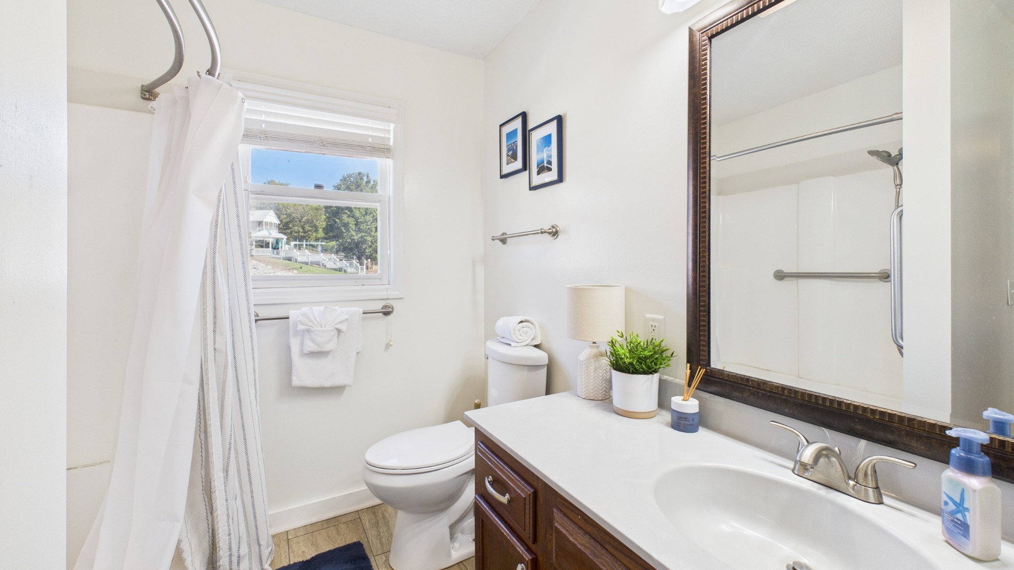 103 Harbor View Drive Grand Rivers, KY 42045 - Photo 17 of 38 a bathroom with a sink vanity mirror and toilet