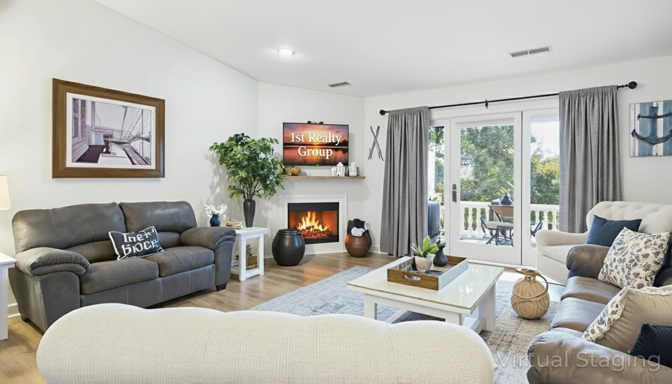 103 Harbor View Drive Grand Rivers, KY 42045 - Photo 19 of 38 a living room with furniture large window and fireplace
