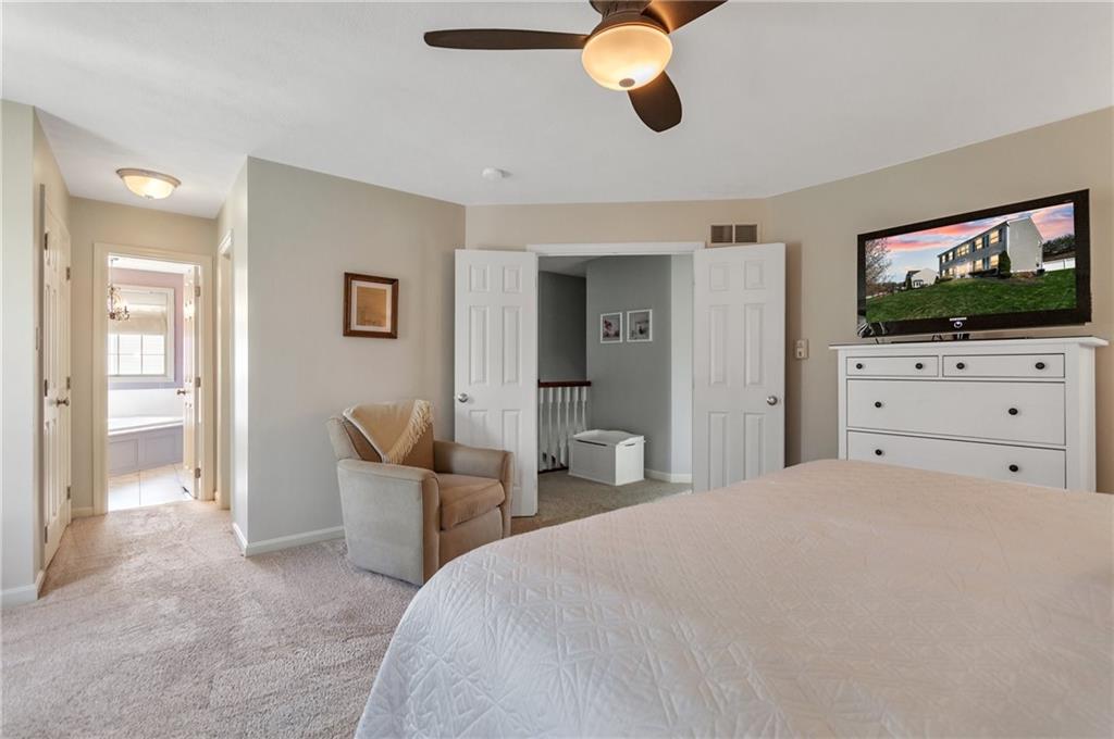 5012 Silver Oaks Drive McKees Rocks, PA 15136 - Photo 16 of 25 a bedroom with a bed and view of living room