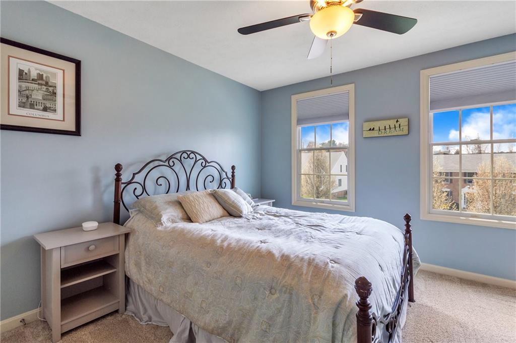 5012 Silver Oaks Drive McKees Rocks, PA 15136 - Photo 21 of 25 a bedroom with a bed and a window