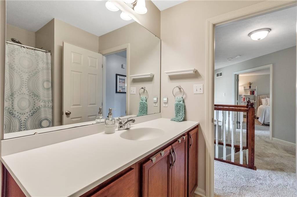 5012 Silver Oaks Drive McKees Rocks, PA 15136 - Photo 22 of 25 a bathroom with a sink double vanity and a mirror