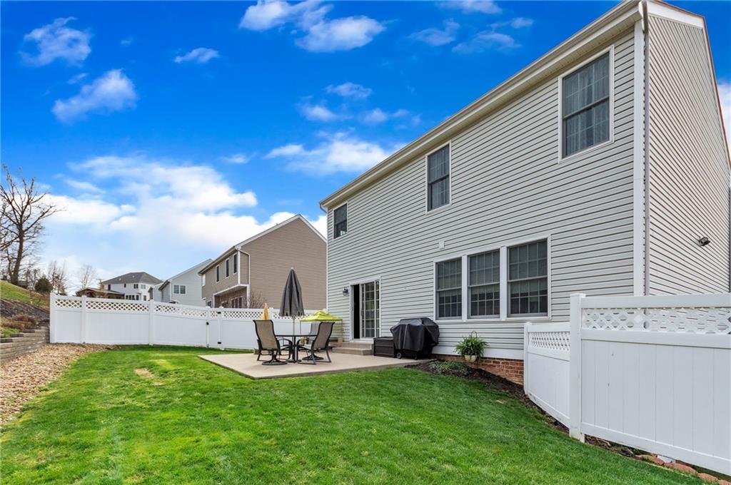 5012 Silver Oaks Drive McKees Rocks, PA 15136 - Photo 24 of 25 a view of a house with backyard and sitting area