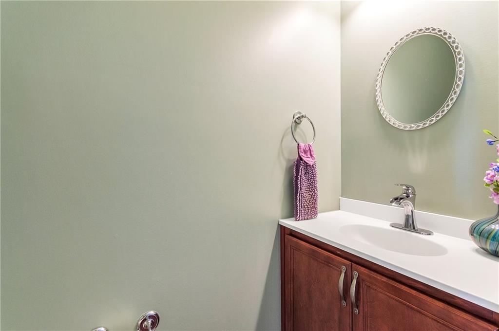 5012 Silver Oaks Drive McKees Rocks, PA 15136 - Photo 6 of 25 a bathroom with a sink and a mirror
