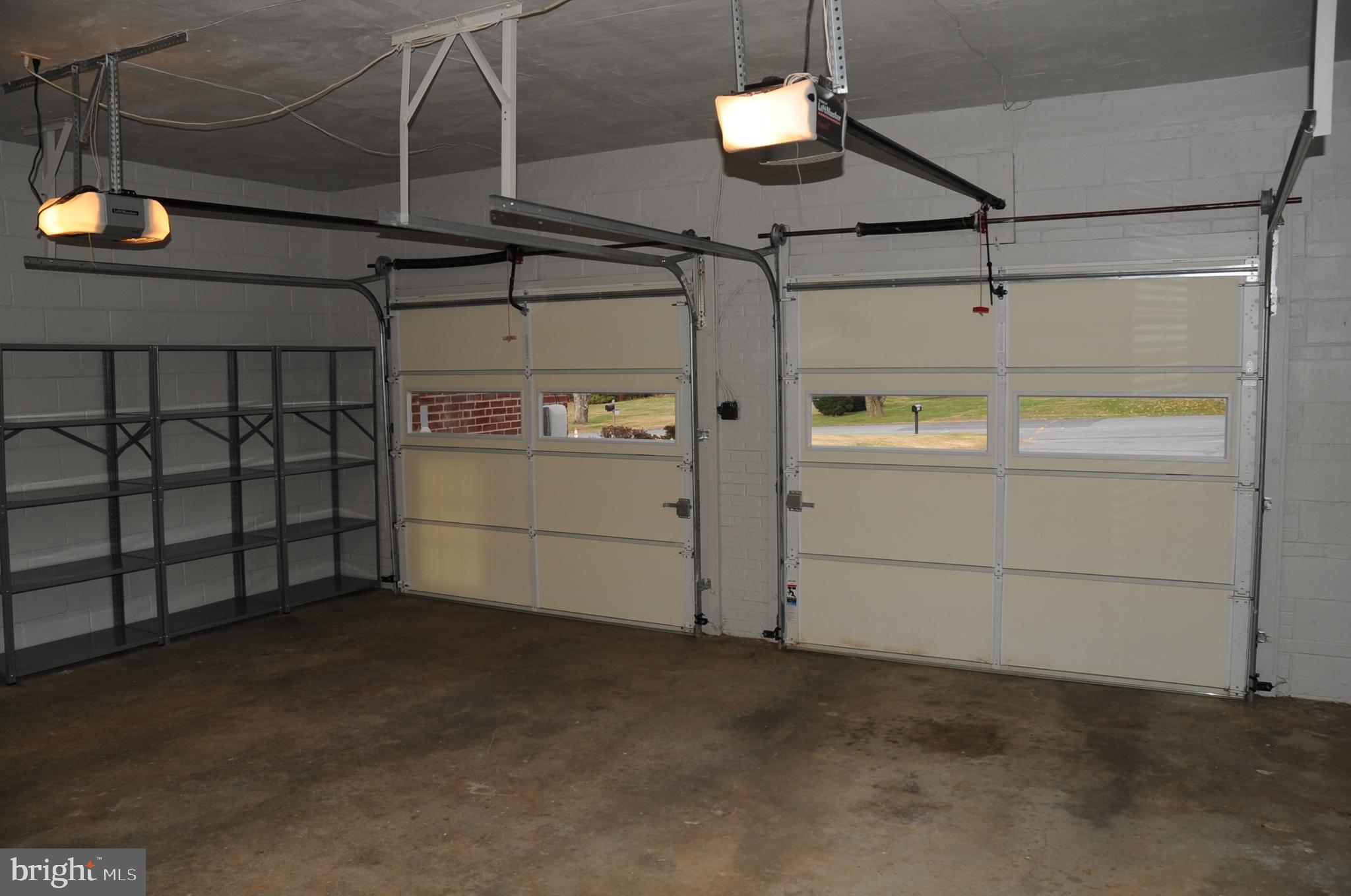 16632 Alden Avenue Gaithersburg, MD 20877 - Photo 54 of 57 2 car garage with shelves