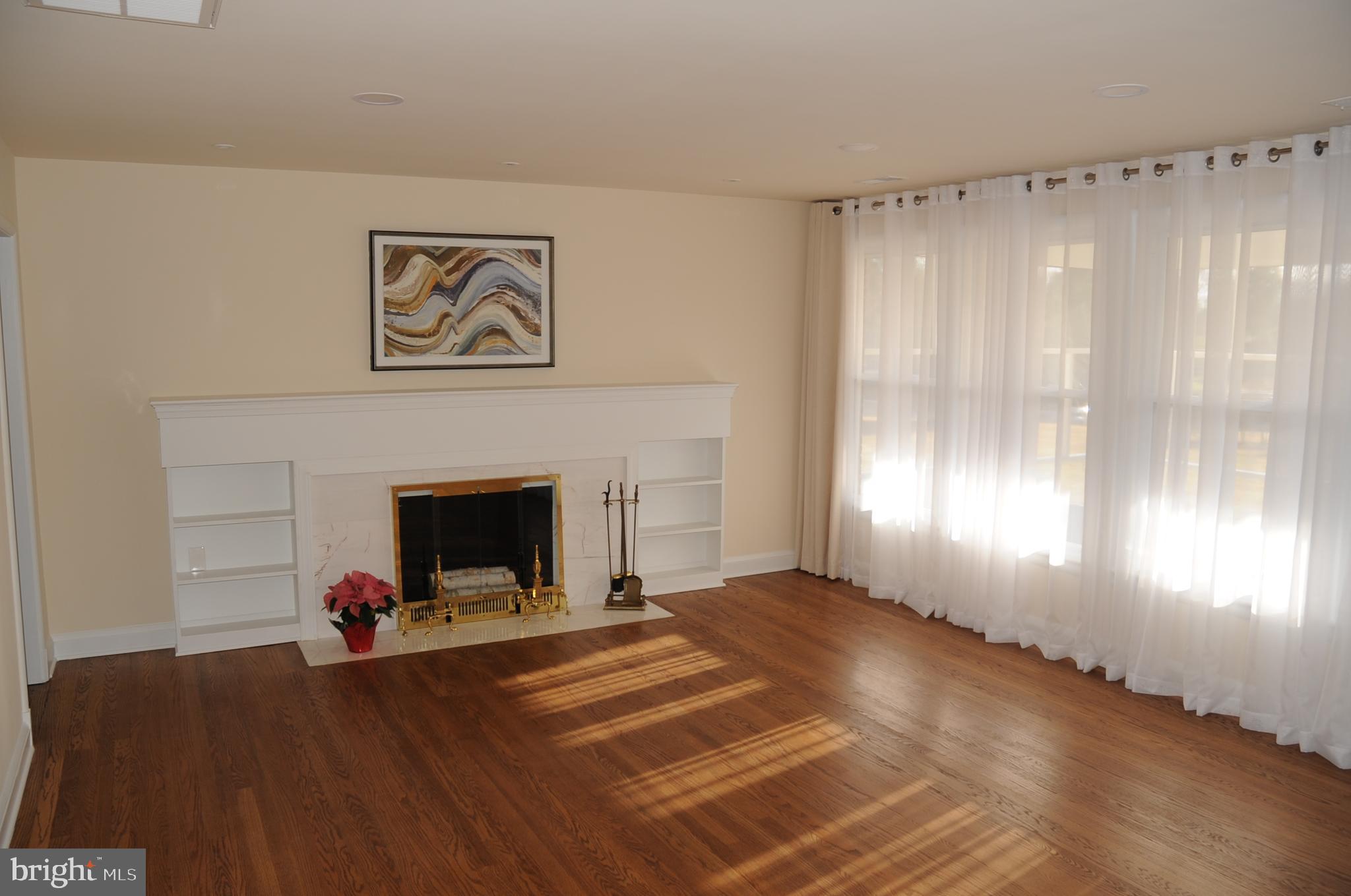 16632 Alden Avenue Gaithersburg, MD 20877 - Photo 10 of 57 Living room with fireplace