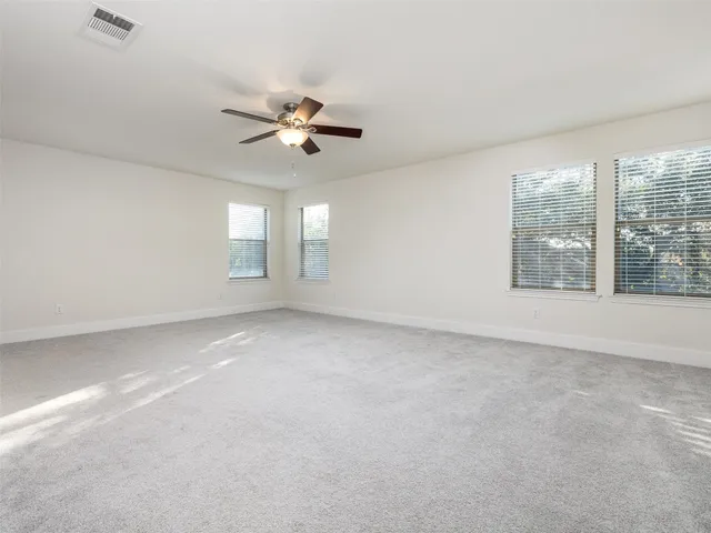 a bathroom with a double vanity sink mirror and