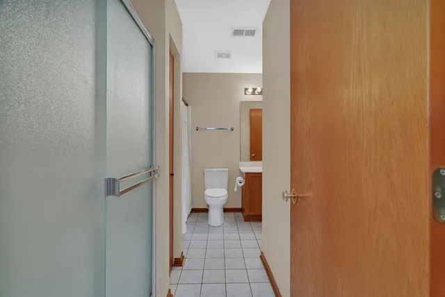a bathroom with a sink and a toilet