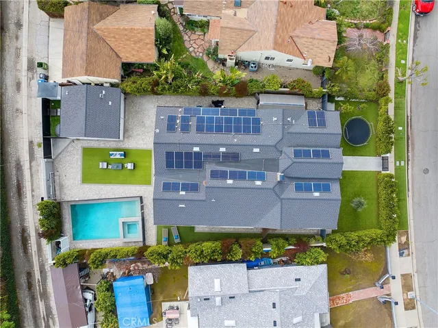 an aerial view of a building with a street view