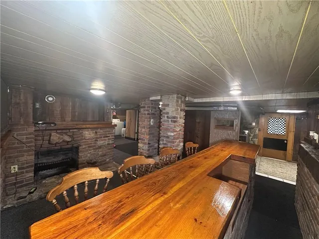 a view of a chairs and table in a room