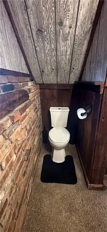 a bed room with a bed and a window