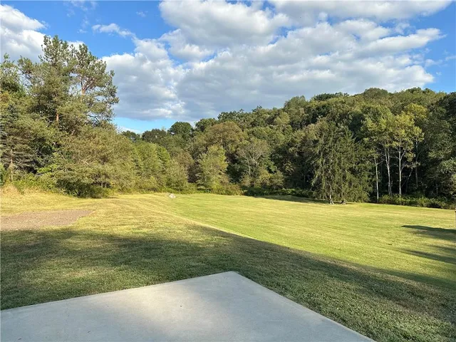 a view of an ocean from a yard