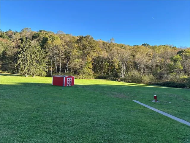 a view of a field of a house