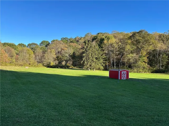 a view of an outdoor space and a yard