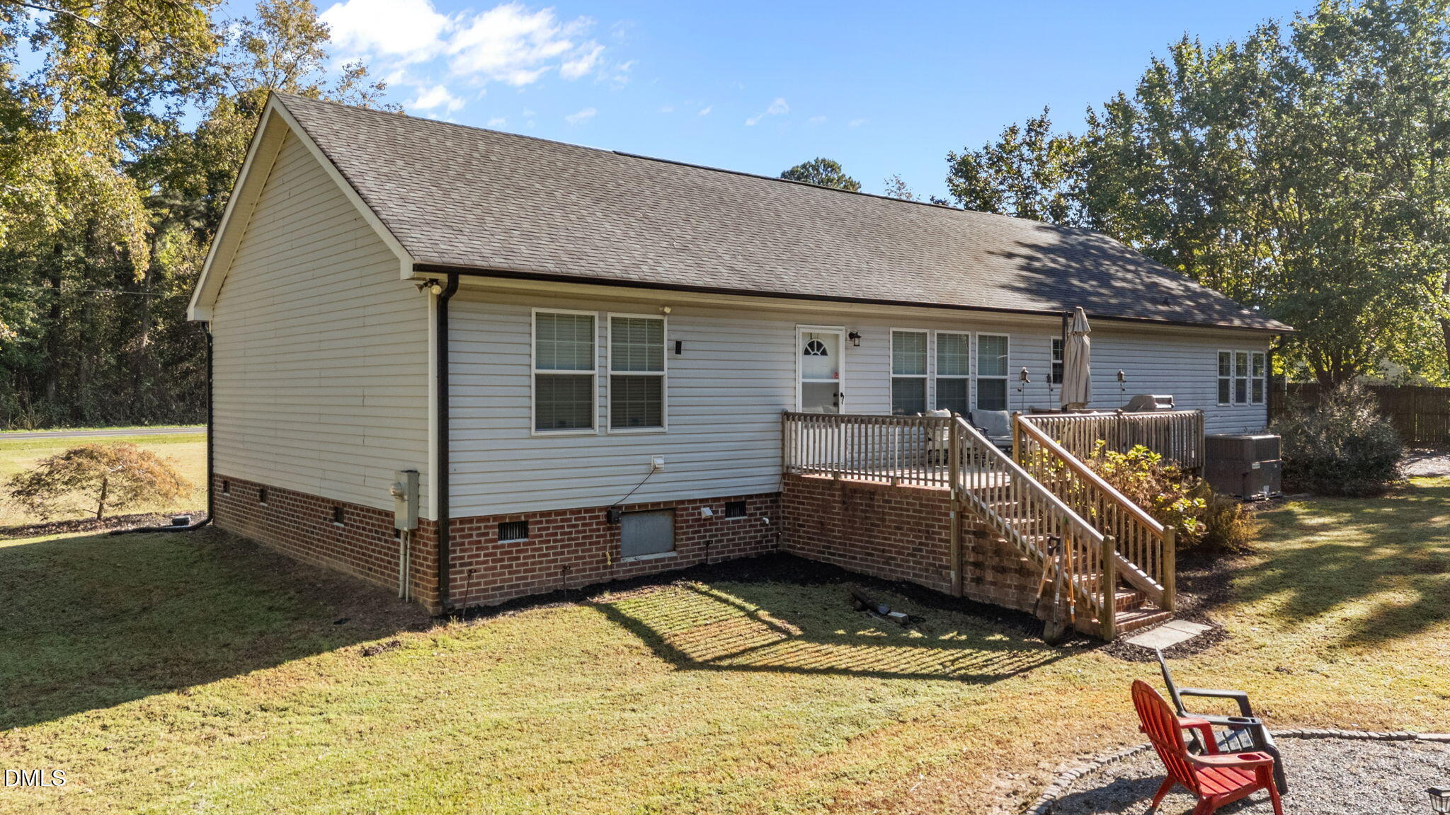 2450 Frazier Road Middlesex, NC 27557 - Photo 12 of 50 a view of a house with a wooden deck