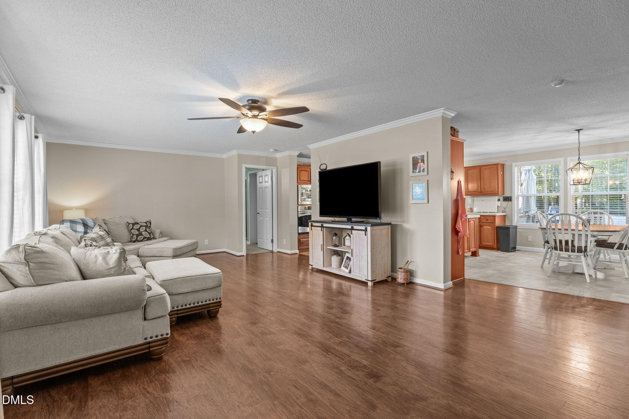 2450 Frazier Road Middlesex, NC 27557 - Photo 13 of 50 a living room with furniture and a flat screen tv
