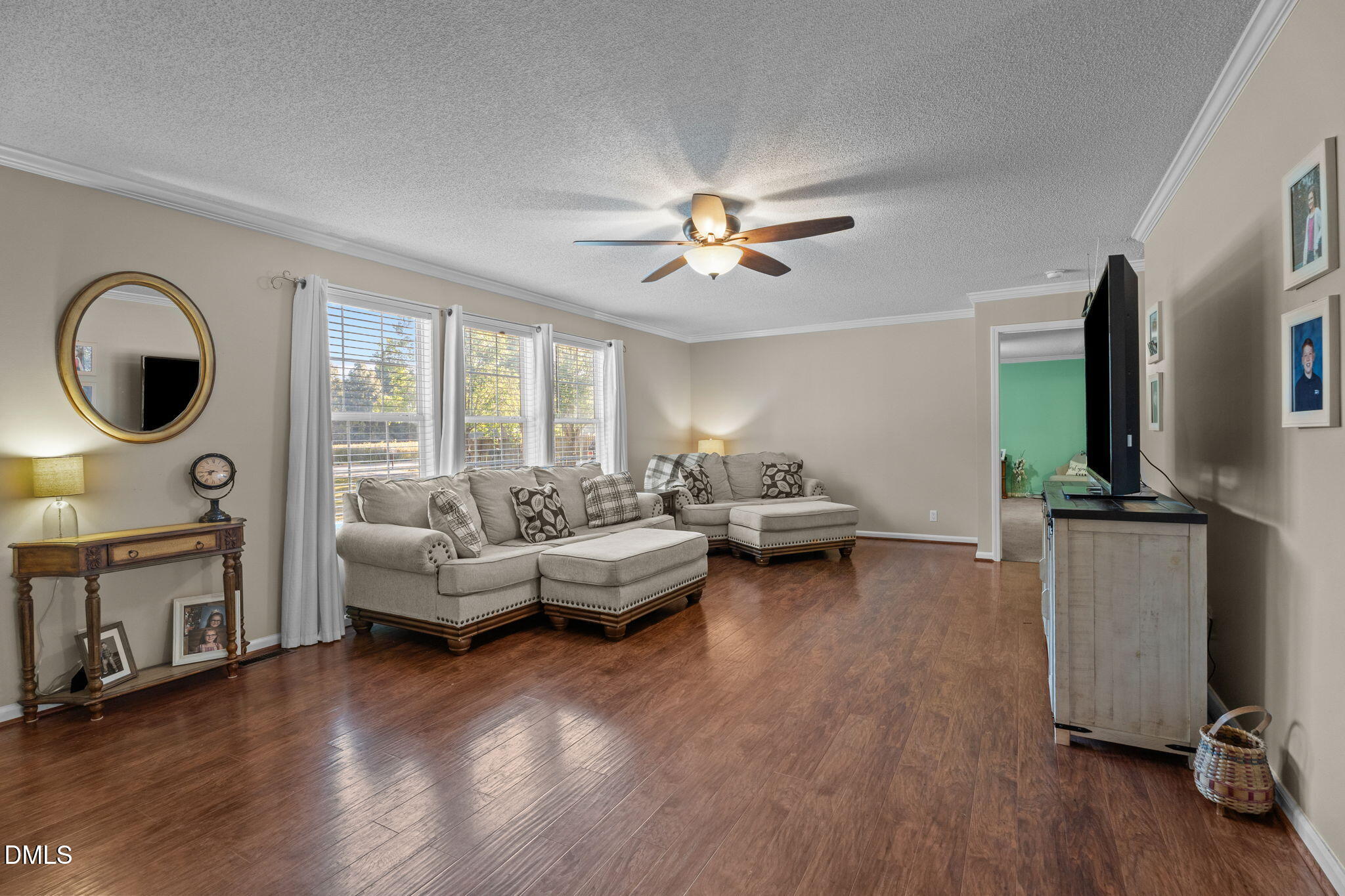 2450 Frazier Road Middlesex, NC 27557 - Photo 14 of 50 a living room with furniture and a flat screen tv
