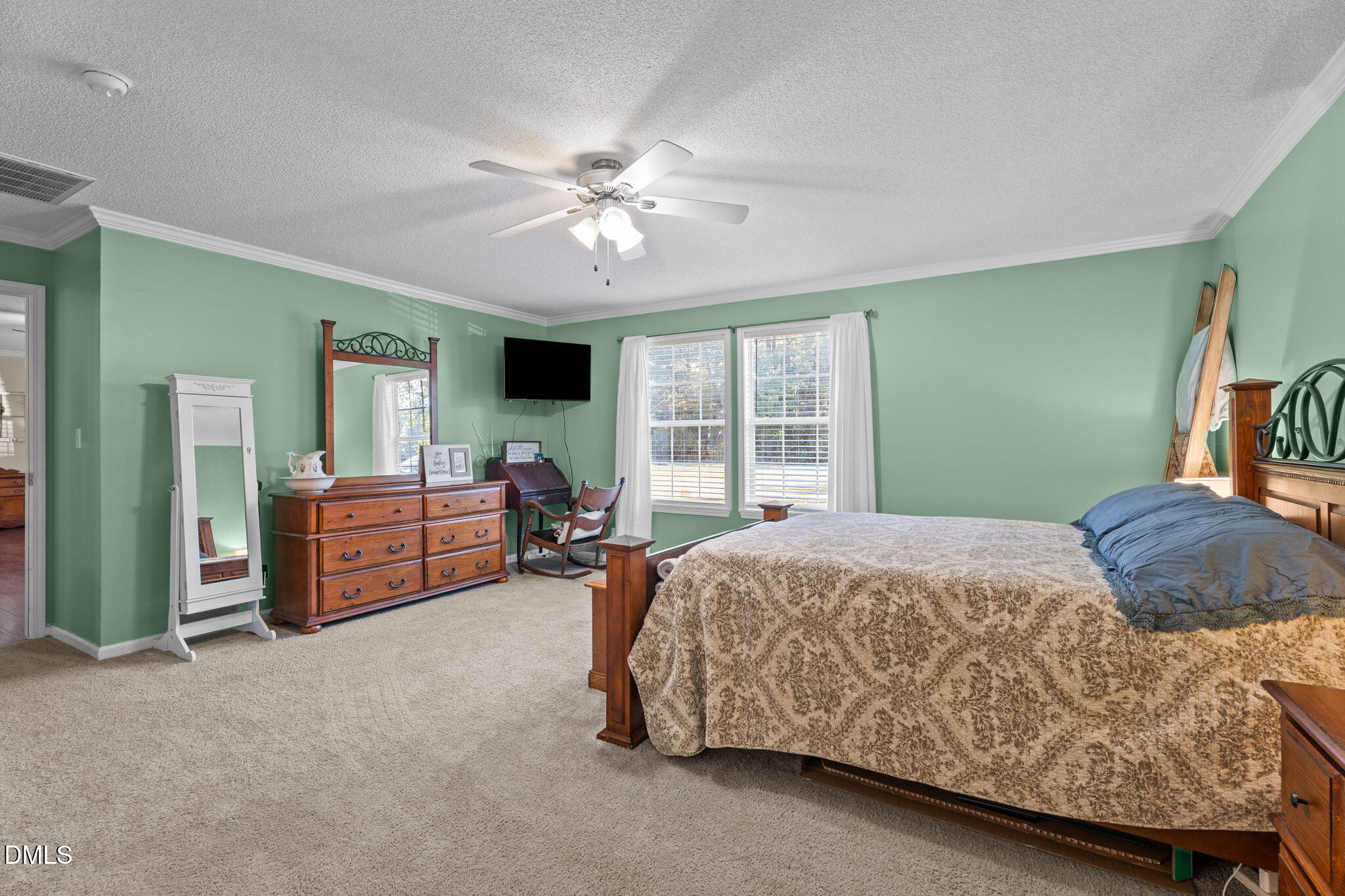 2450 Frazier Road Middlesex, NC 27557 - Photo 24 of 50 a bed room with a bed and furniture